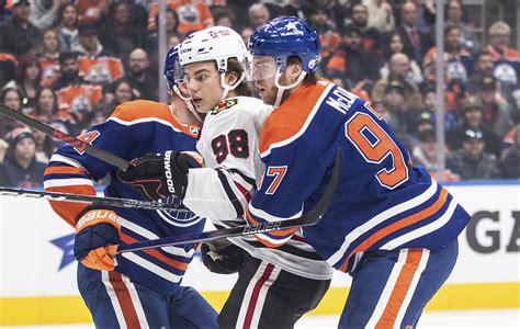 Bedard scores early but McDavid gets 2 assists to lead Oilers past Blackhawks 4-1 for 8th straight